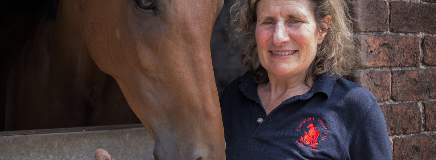 Image shows Sue Taylor with a horse